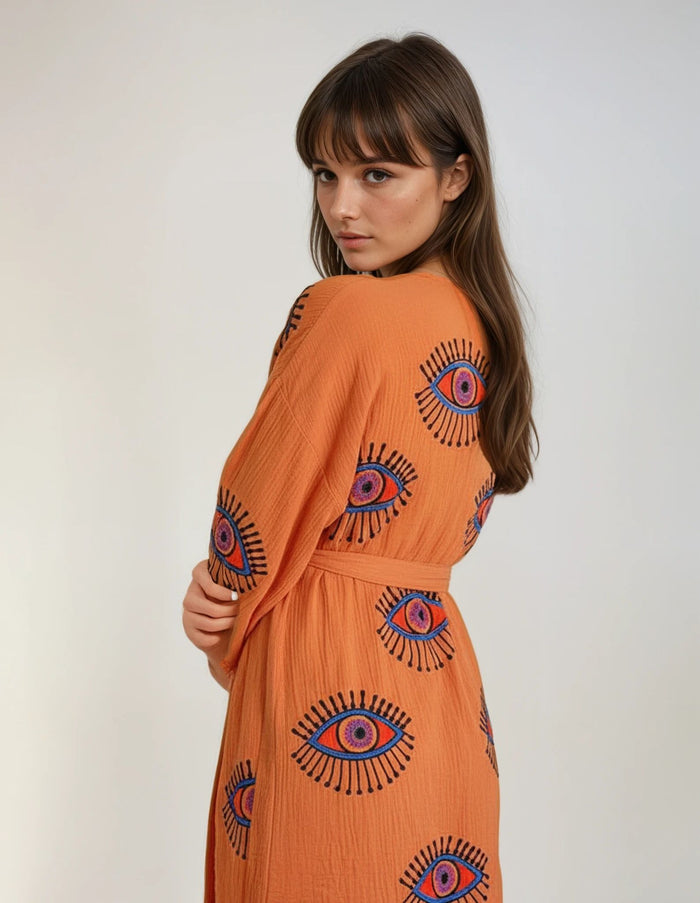 611fc05e3c4ce80992caae23_orange-evil-eye-kimono-3_1780523533897.jpeg