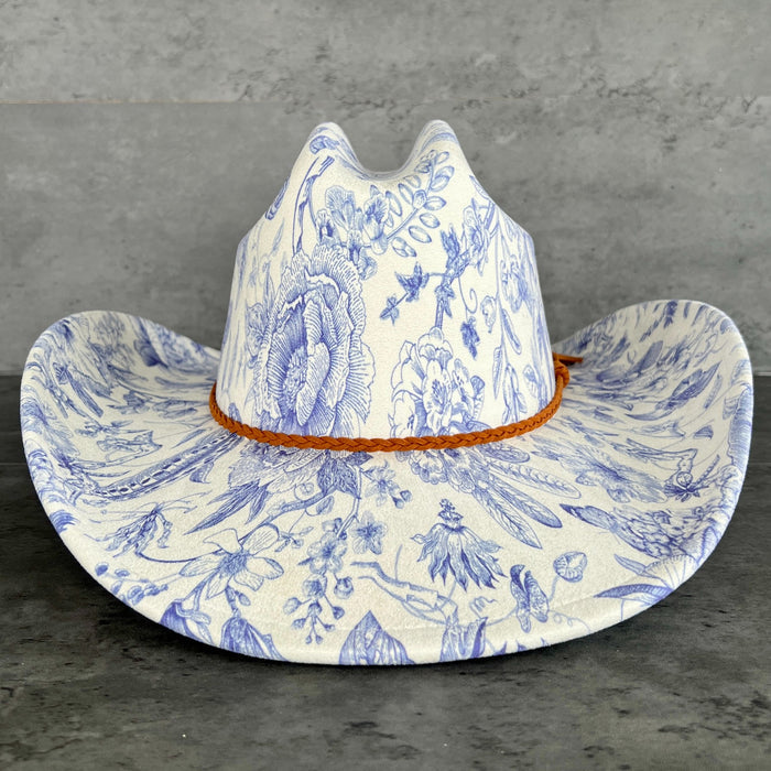 611fc05e3c4ce80992caae23_blue-chinoiserie-ivory-cattleman-cowboy-front_1776441449914.jpg