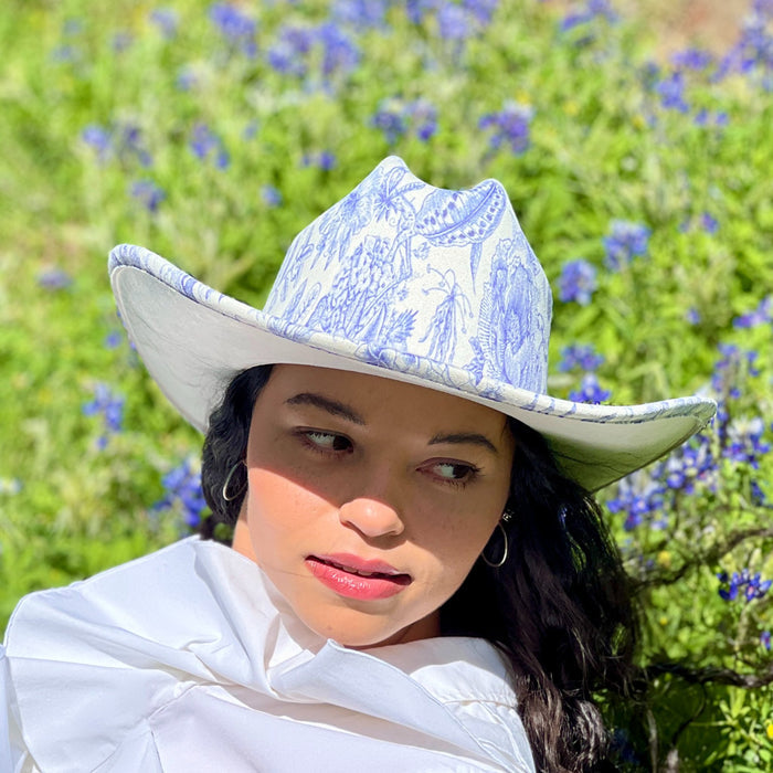 611fc05e3c4ce80992caae23_blue-chinoiserie-ivory-cattleman-cowboy-lifestyle-10_1776441500719.jpg