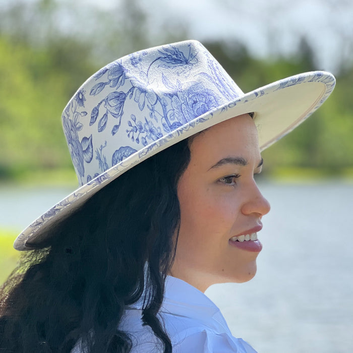611fc05e3c4ce80992caae23_blue-chinoiserie-ivory-teardrop-rancher-lifestyle-1_1776441872716.jpg