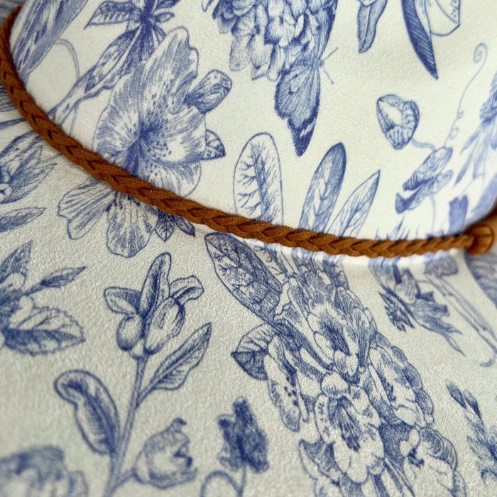 611fc05e3c4ce80992caae23_blue-chinoiserie-ivory-teardrop-rancher-detail_1776441946310.jpg
