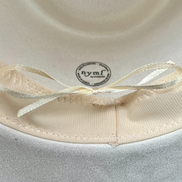 611fc05e3c4ce80992caae23_blue-chinoiserie-ivory-teardrop-rancher-drawstring_1776441968424.jpg