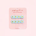 611fc05e3c4ce80992caae23_blue-flower-hair-clips-on-pink-background-copy_1771223563642.jpg