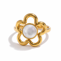 611fc05e3c4ce80992caae23_gold-flower-ring-with-a-central-pearl_1777395695050.png