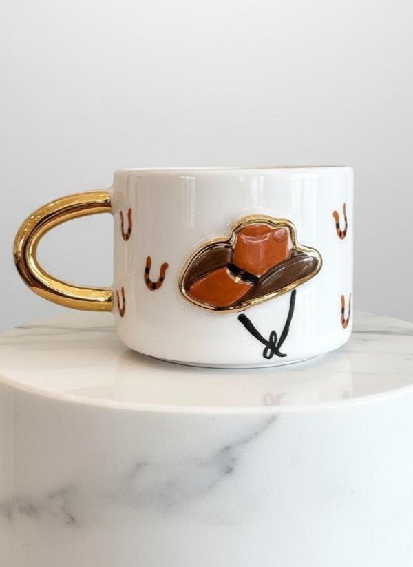 611fc05e3c4ce80992caae23_hat-ceramic-mug_1770679823640.jpg