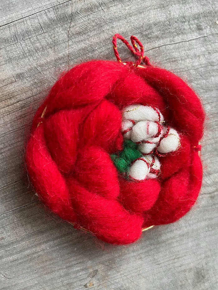 611fc05e3c4ce80992caae23_deck-the-halls-red-wreath-with-peppermint-c-_1763268545690.jpg