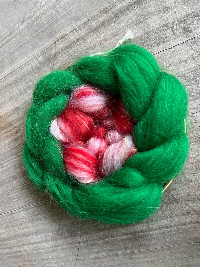 611fc05e3c4ce80992caae23_green-wreath-ornament_1763270304598.jpg