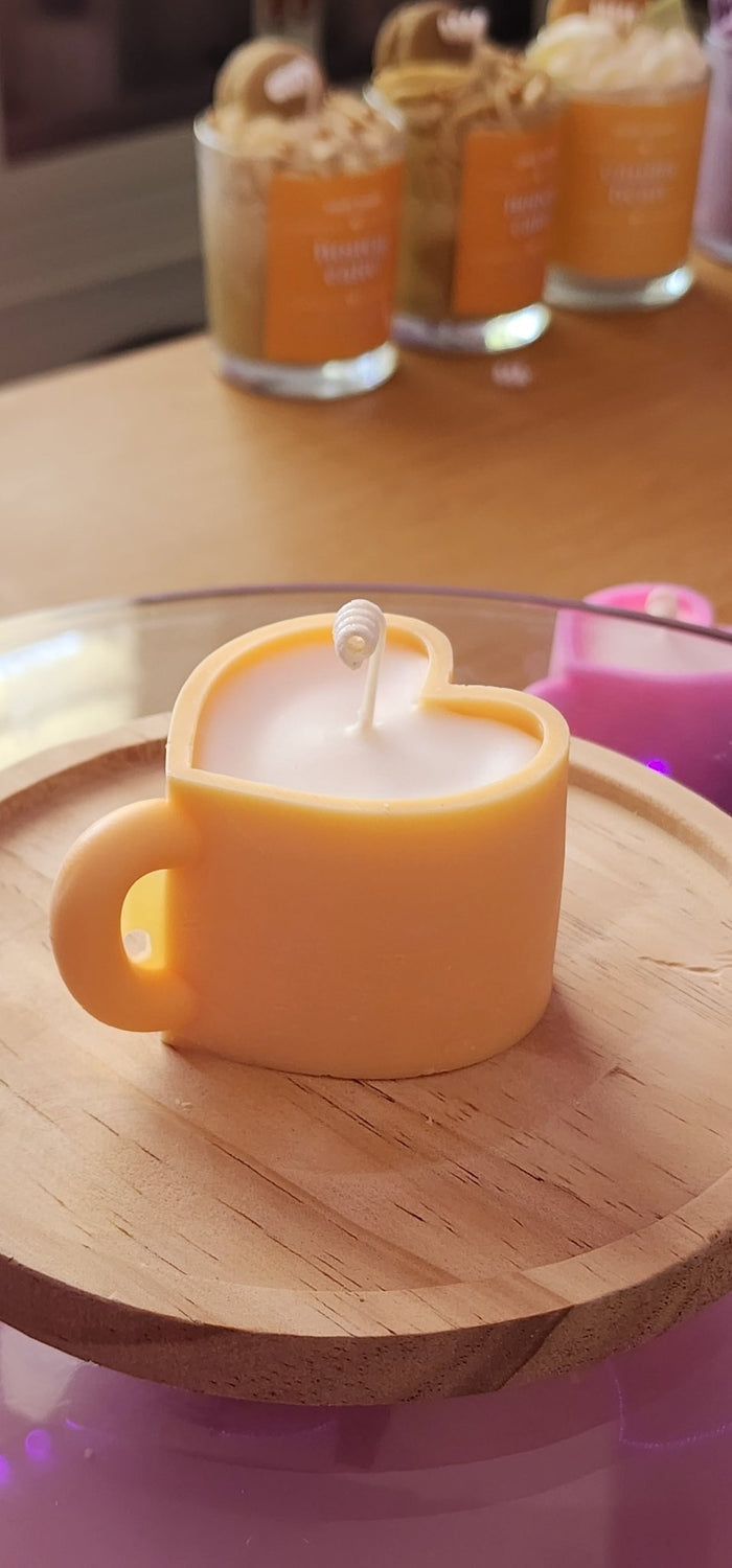 611fc05e3c4ce80992caae23_yellow-love-cup-candle_1783731283518.jpg