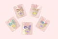 611fc05e3c4ce80992caae23_iridescent-hair-accessories-display_1771224190385.png