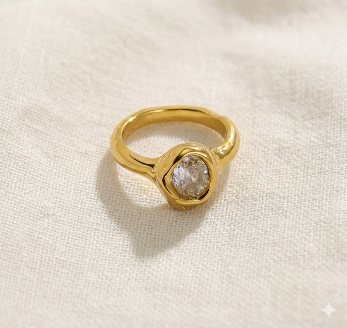 611fc05e3c4ce80992caae23_gold-ring-with-a-diamond-in-organic-shape_1777396434200.png