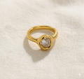 611fc05e3c4ce80992caae23_gold-ring-with-a-diamond-in-organic-shape_1777396434200.png