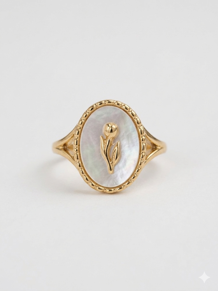 611fc05e3c4ce80992caae23_gold-ring-with-a-golden-flower-set-in-pearl-oval-with-studded-design_1777396863433.png