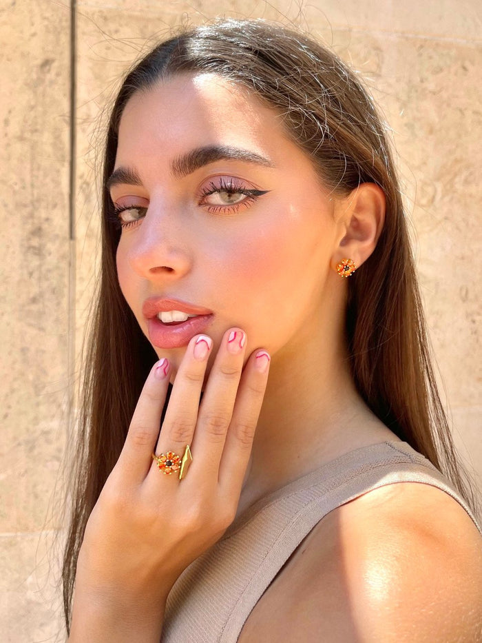 611fc05e3c4ce80992caae23_poppy-studs-2_1781209007026.jpg