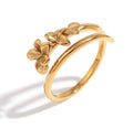 611fc05e3c4ce80992caae23_gold-spiral-ring-with-floral-design_1777397277696.jpg