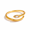 611fc05e3c4ce80992caae23_gold-spiral-ring-with-a-diamond_1777395444580.png