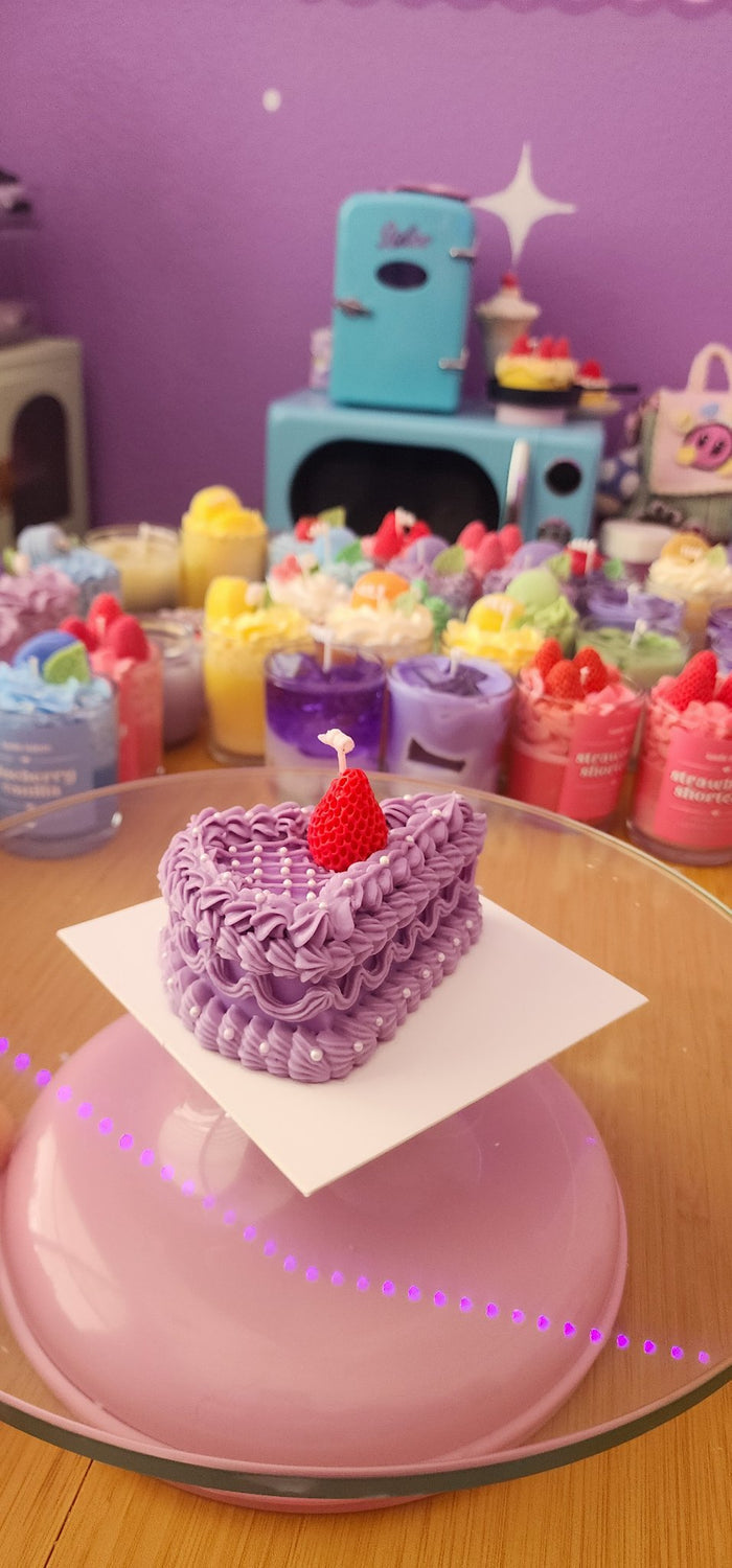 611fc05e3c4ce80992caae23_purple-cake-slice-candle2_1783730513622.jpg