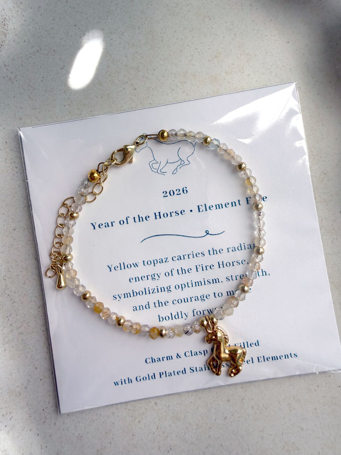 611fc05e3c4ce80992caae23_year-of-the-horse-bracelet-topaz-12_1771023048614.jpg