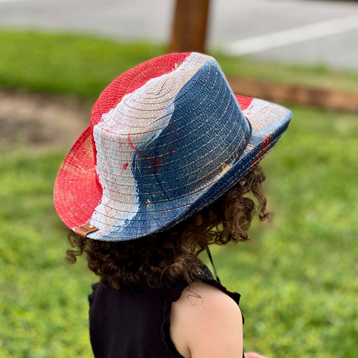 611fc05e3c4ce80992caae23_red-white-blue-kids-straw-cowboy-lifestyle-4_1780938584951.jpg